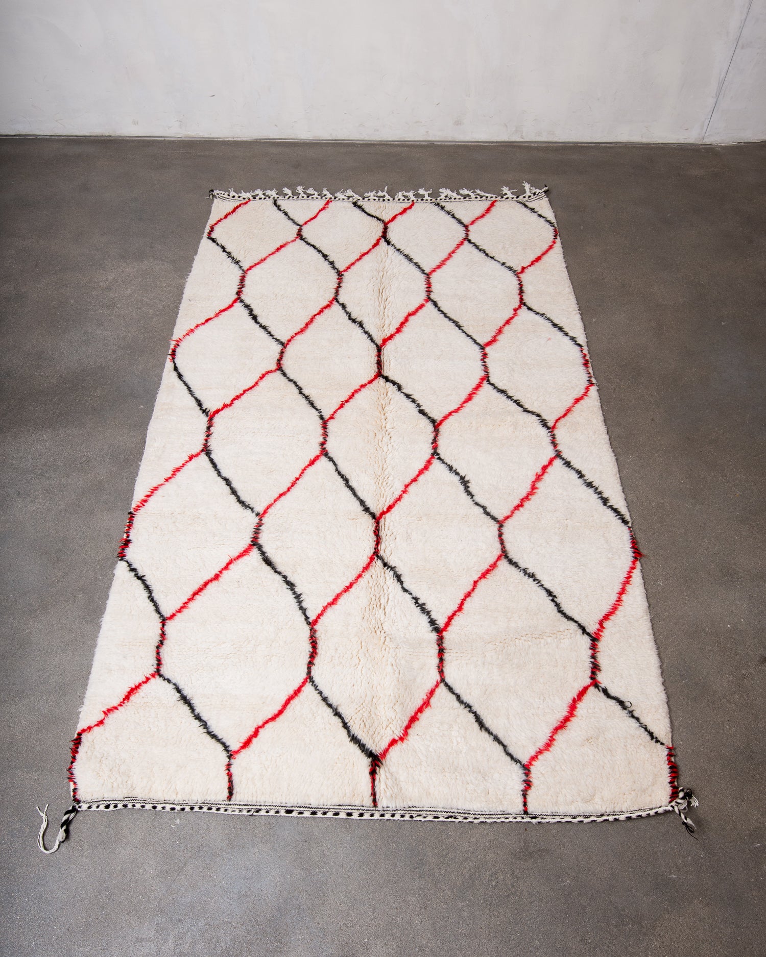 Modern, designer, handcrafted Berber rug from Morocco. Beniourain carpet with beautiful colours and patterns and fluffy wool texture.